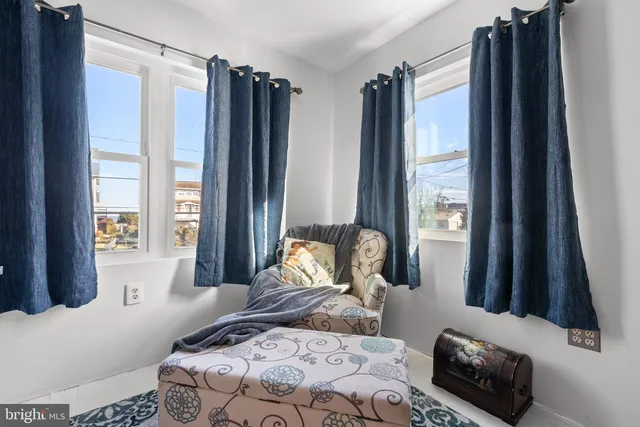 a stove top oven sitting inside of a kitchen
