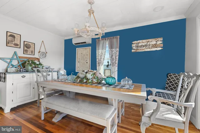 a living room with furniture and window