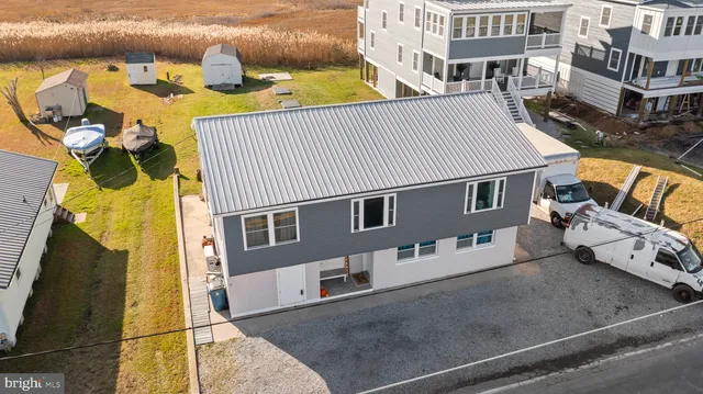 a view of a house with a street
