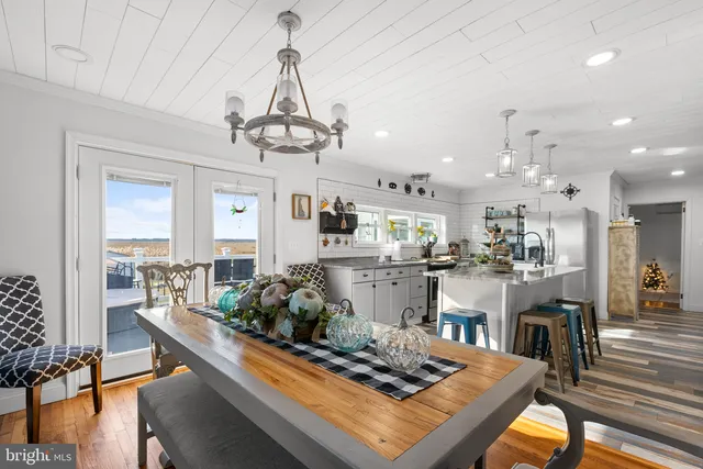 a view of roof deck with patio