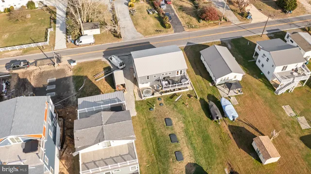 a view of walk in closet with clothes and water camper