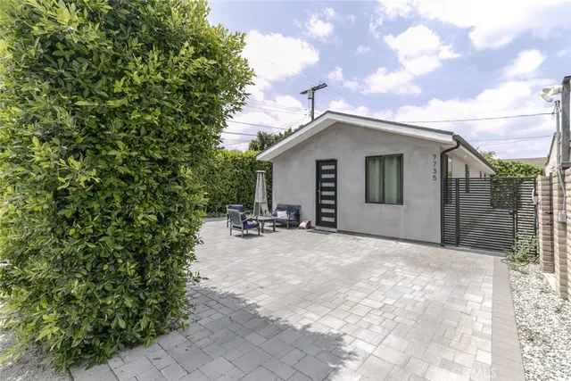 a backyard of a house with lots of green space