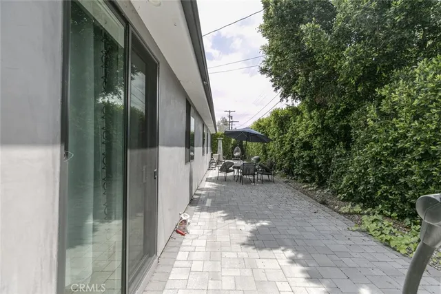 a view of a swimming pool with a yard