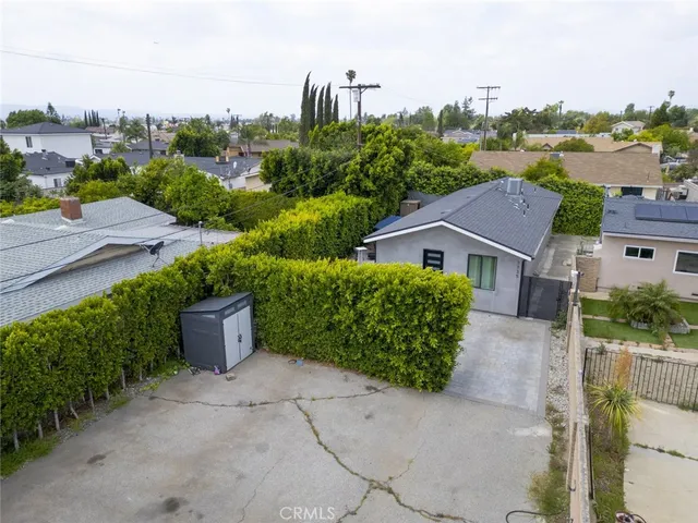a aerial view of a house and outdoor space