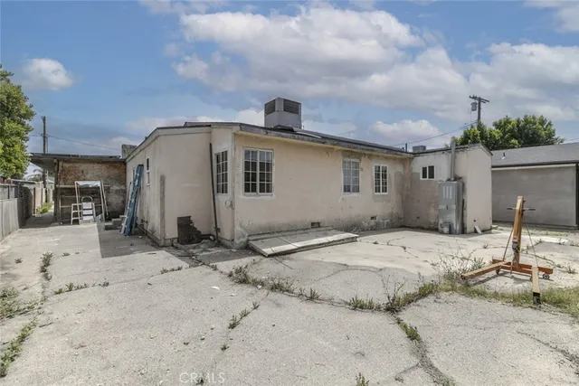 a view of a terrace with sitting area