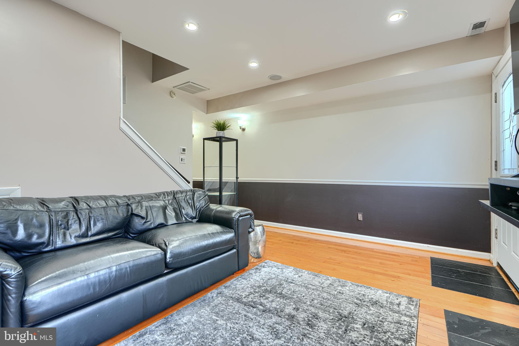 624 Jasper Street Baltimore, MD 21201 - Photo 15 of 24 a living room with furniture and rug