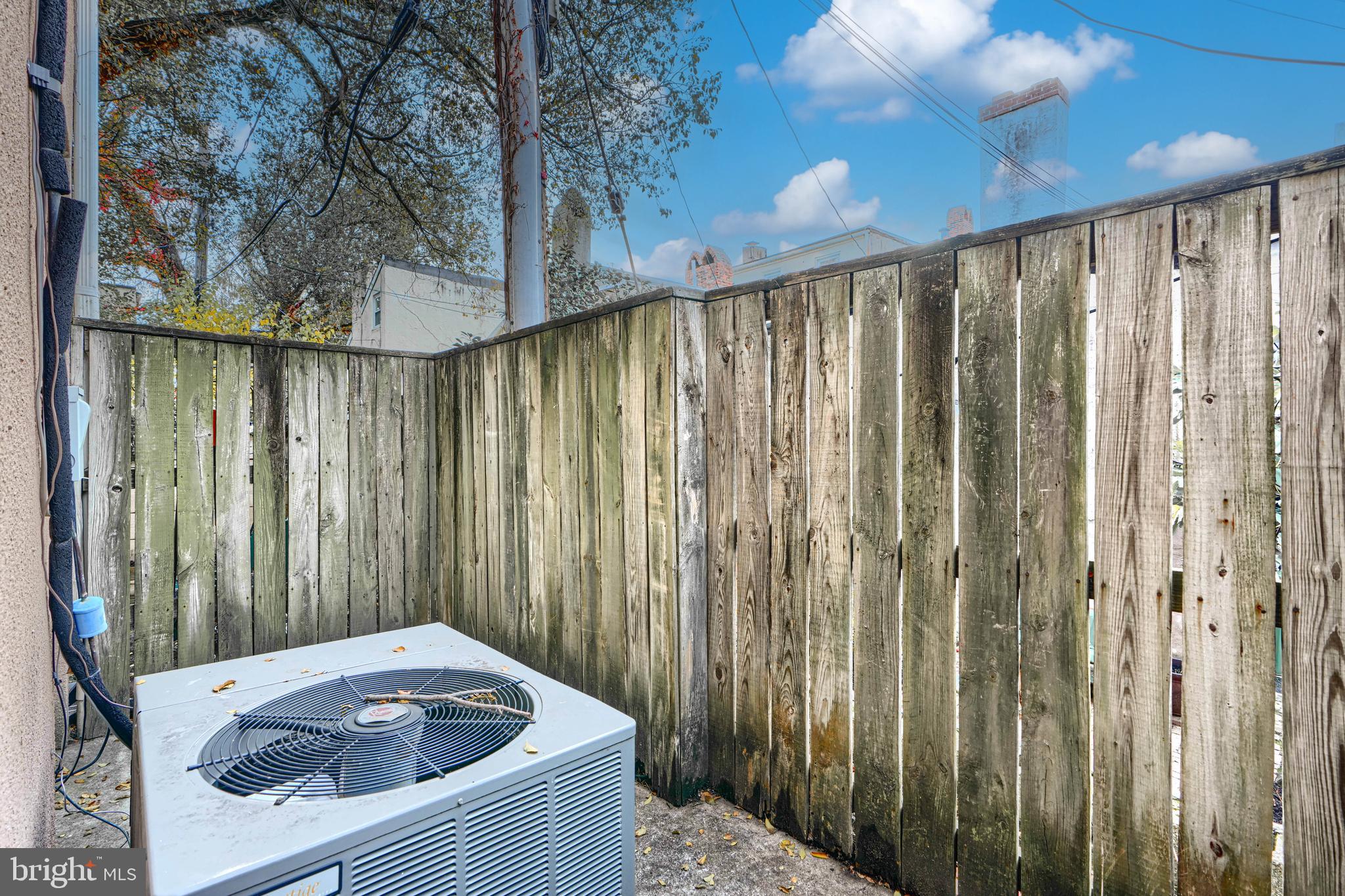 624 Jasper Street Baltimore, MD 21201 - Photo 24 of 24 a bathroom with a sink and curtain