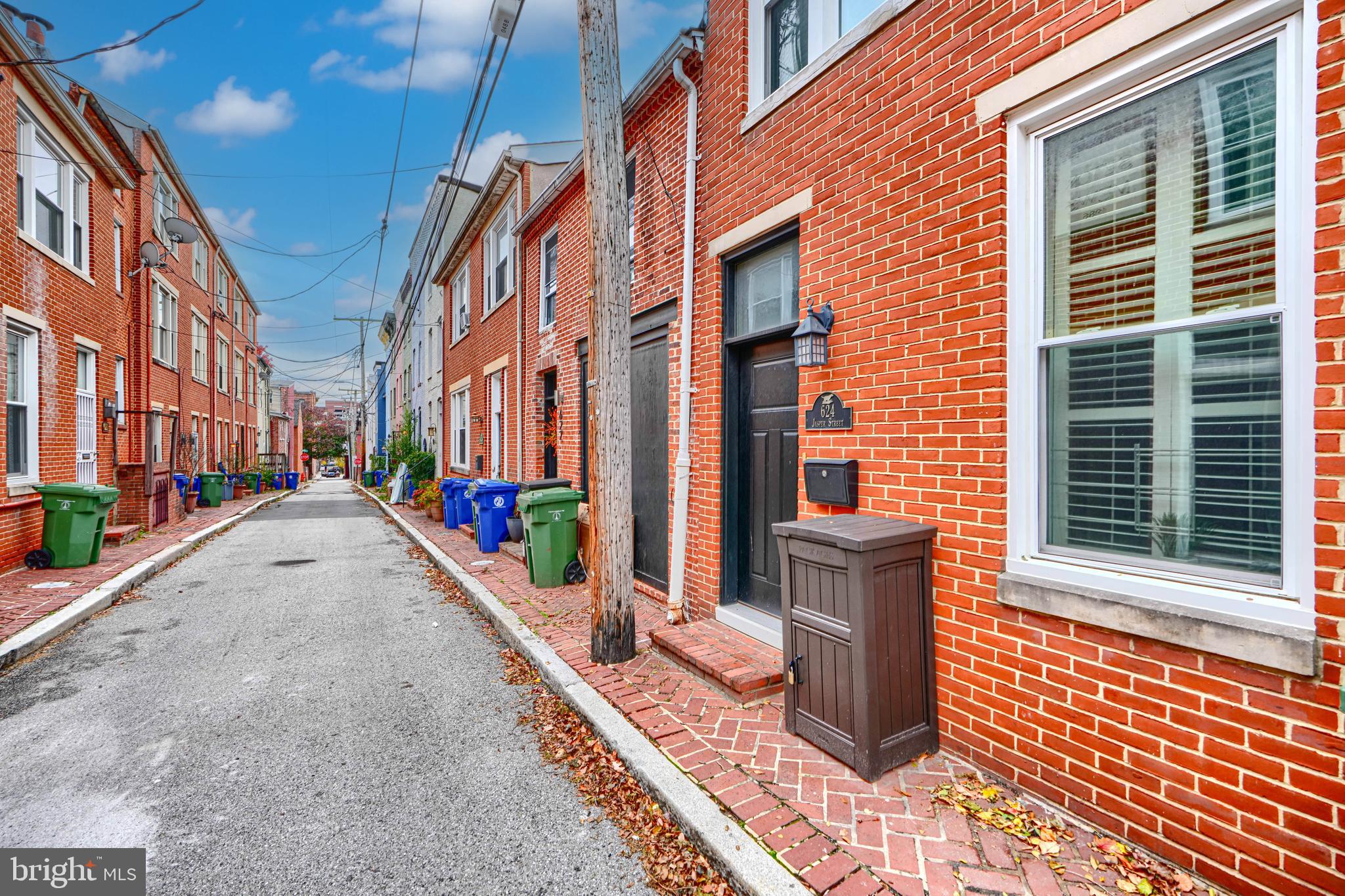 624 Jasper Street Baltimore, MD 21201 - Photo 3 of 24 a view of a brick buildings with many windows