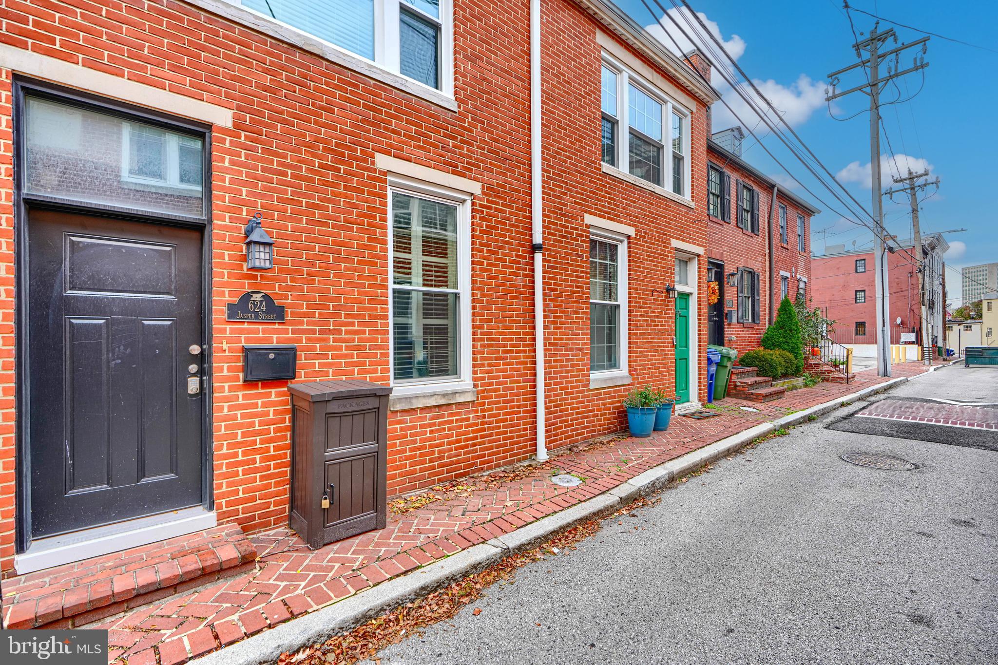624 Jasper Street Baltimore, MD 21201 - Photo 4 of 24 a view of a brick building with many windows