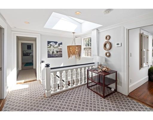 562 Main Street Hingham, MA 02043 - Photo 14 of 30 a living room with a baby crib furniture and a window