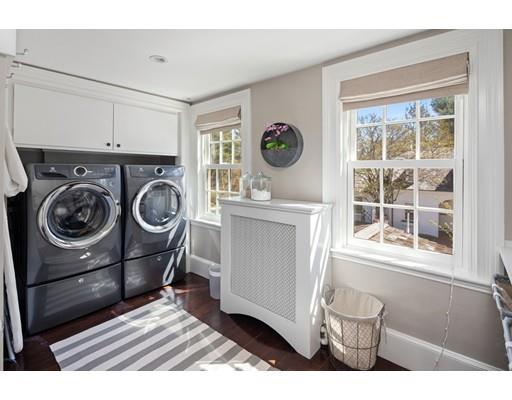562 Main Street Hingham, MA 02043 - Photo 19 of 30 a utility room with dryer and washer