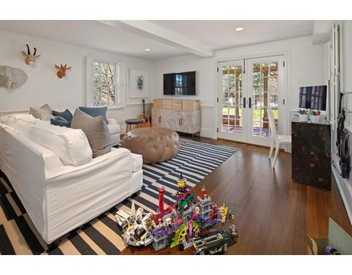 562 Main Street Hingham, MA 02043 - Photo 20 of 30 a living room with furniture and a flat screen tv