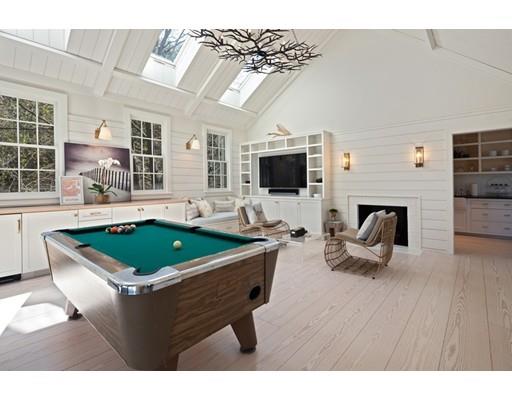 562 Main Street Hingham, MA 02043 - Photo 21 of 30 a living room with furniture and a flat screen tv