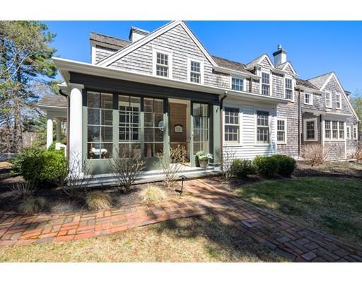 562 Main Street Hingham, MA 02043 - Photo 28 of 30 a front view of a house with garden