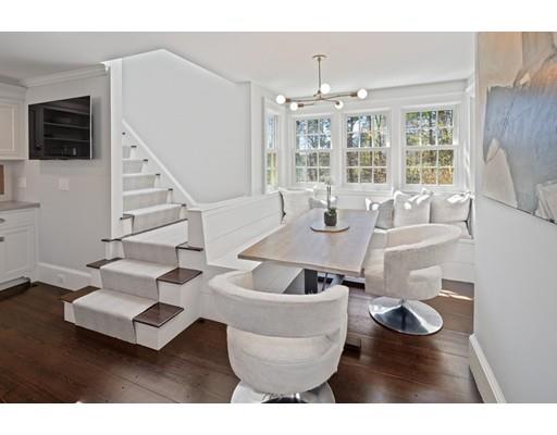 562 Main Street Hingham, MA 02043 - Photo 5 of 30 a living room with furniture and a large window