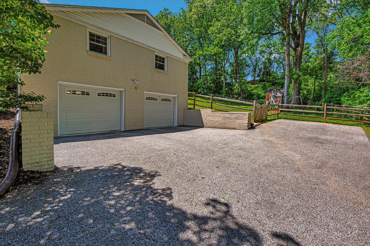1008 Timber Trail Road Baltimore, MD 21286 - Photo 35 of 47 Attached 2-car driveway with additional parking.
