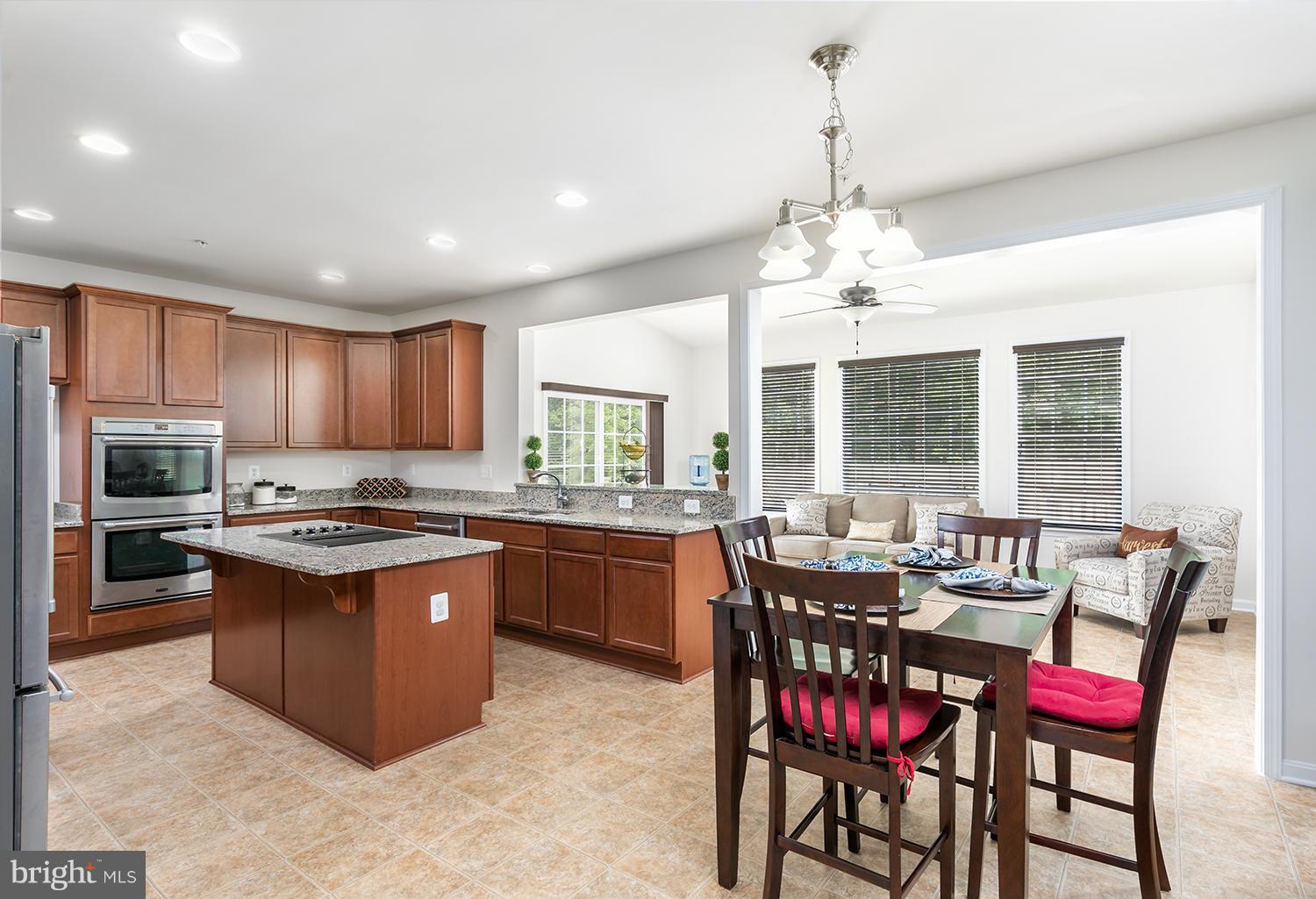 7036 Sand Cherry Way Clinton, MD 20735 - Photo 10 of 30 KITCHEN W/ EAT IN TABLE SPACE
