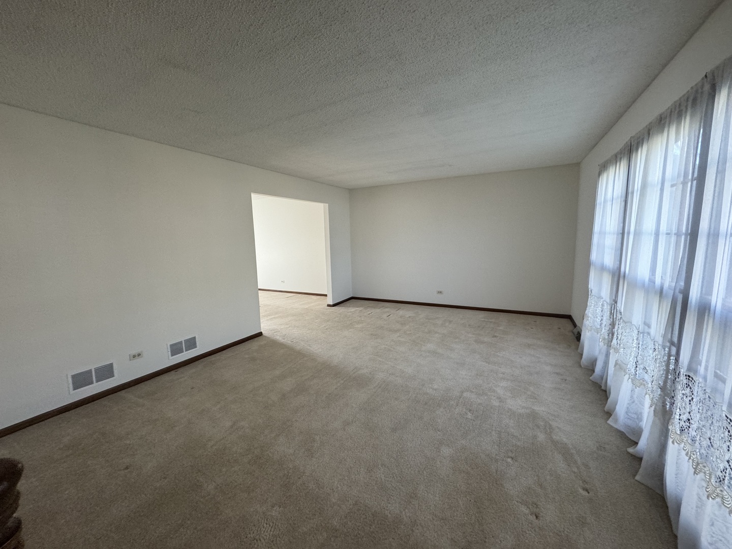 1840 Fairoak Road Naperville, IL 60565 - Photo 2 of 10 an empty room with windows