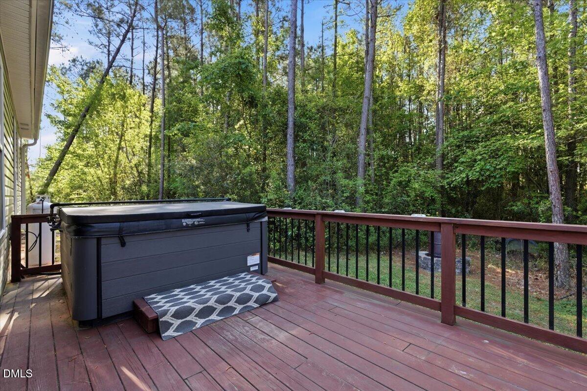 111 West Huckleberry Way Rocky Point, NC 28457 - Photo 11 of 72 a view of balcony with wooden floor