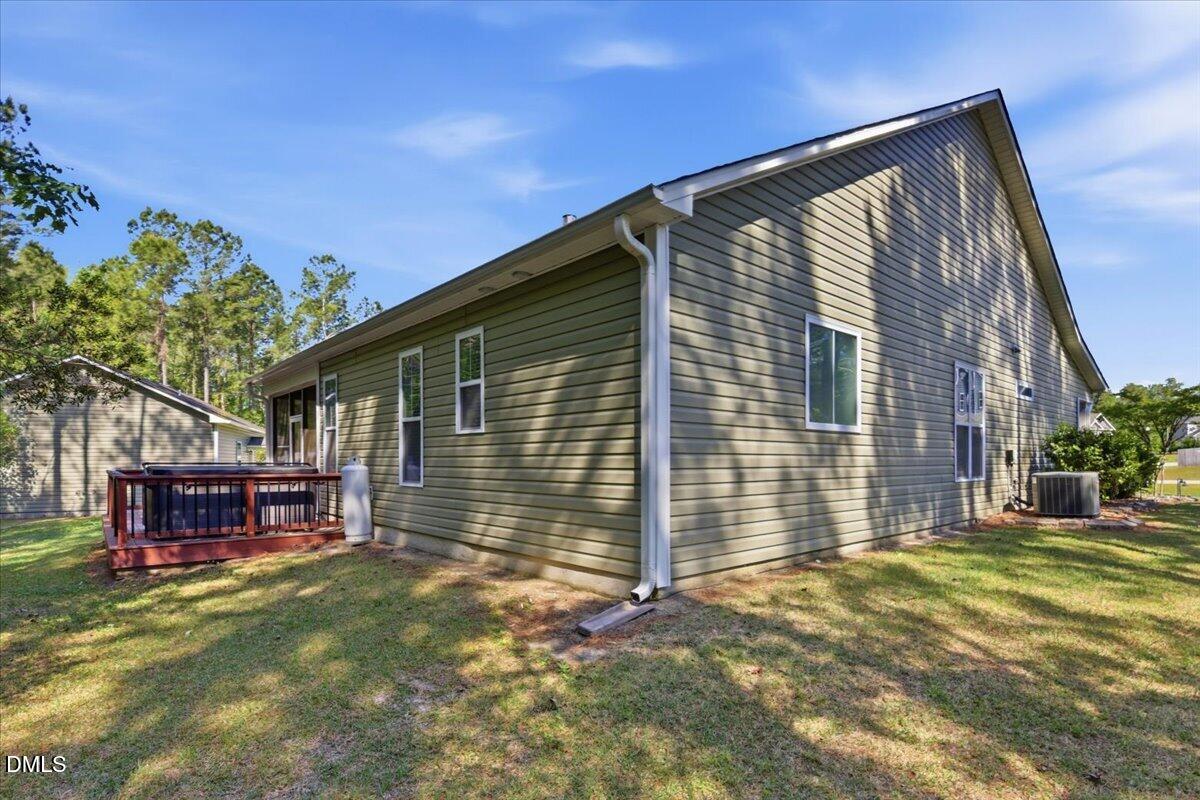 111 West Huckleberry Way Rocky Point, NC 28457 - Photo 15 of 72 a view of a house with a yard
