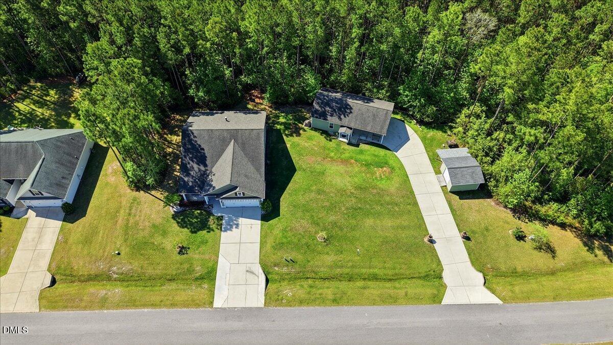 111 West Huckleberry Way Rocky Point, NC 28457 - Photo 21 of 72 an aerial view of residential house with outdoor space and swimming pool