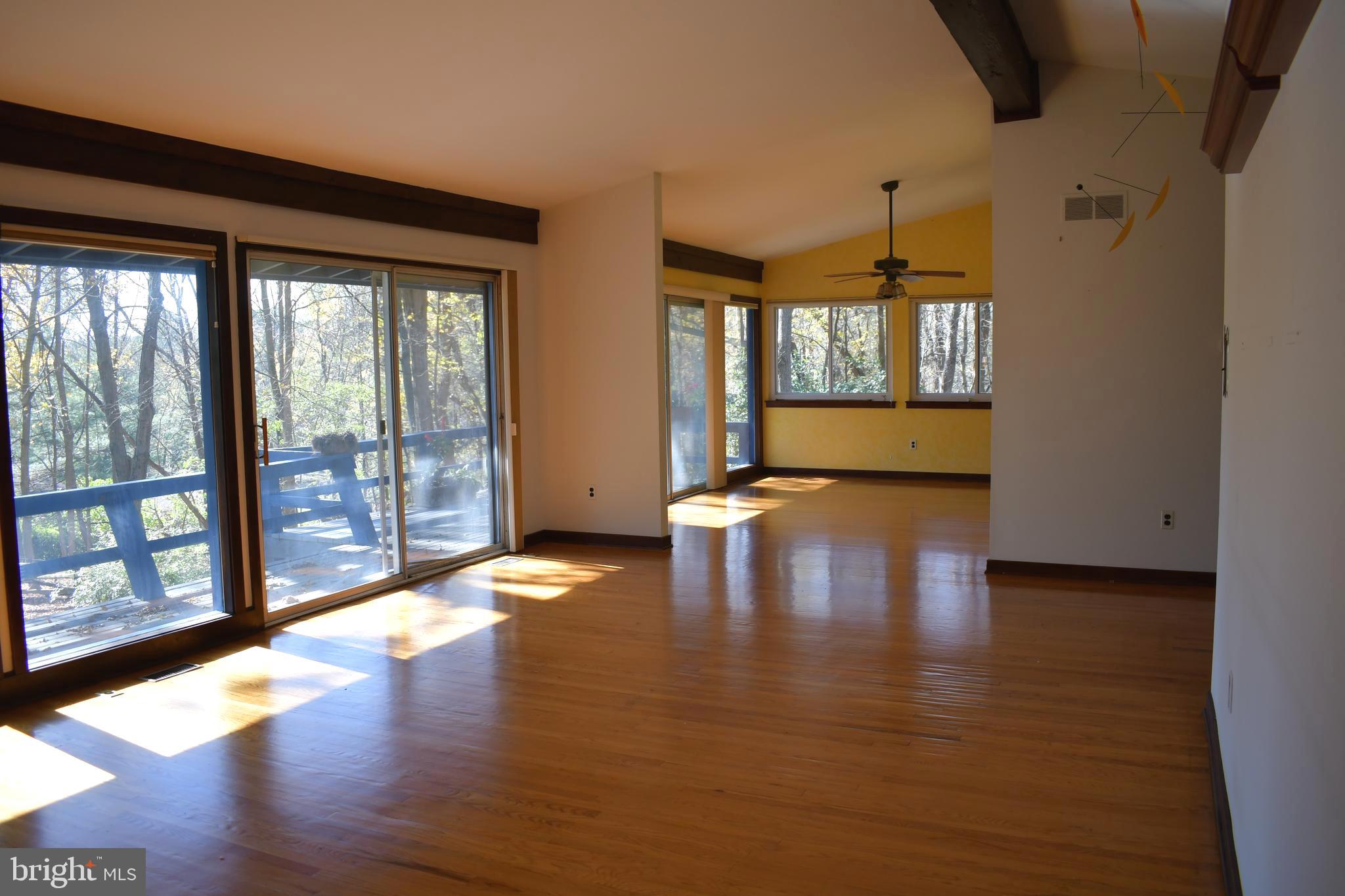 118 Bruce Road Washington Crossing, PA 18977 - Photo 11 of 20 Living room with dinning area beyond