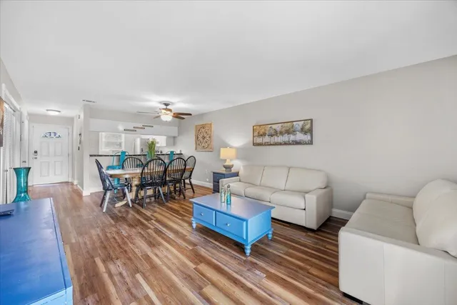a view of a livingroom with washer and dryer