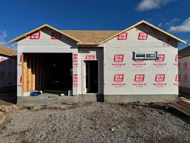 a sign board on the side of a road