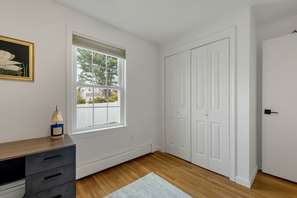 8 Norton Road Hampton, NH 03842 - Photo 20 of 42 a view of an empty room with window and wooden floor