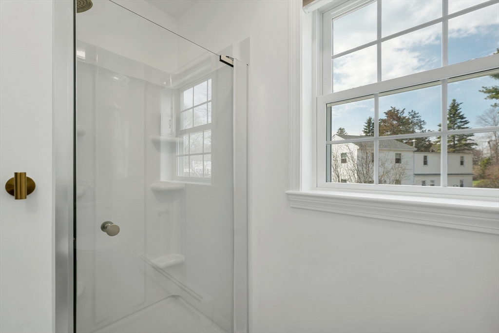 8 Norton Road Hampton, NH 03842 - Photo 30 of 42 a view of a bathroom that has a window
