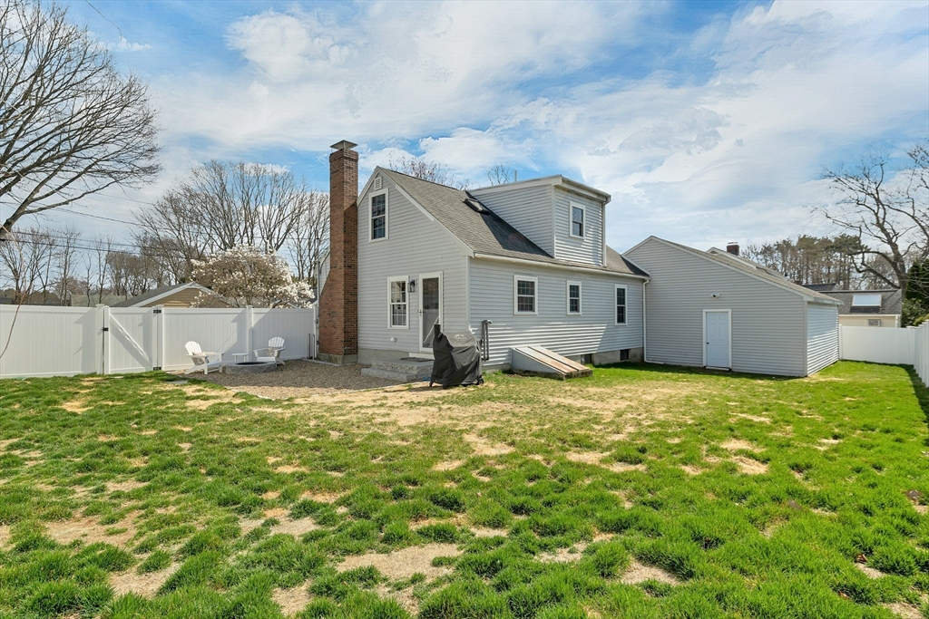 8 Norton Road Hampton, NH 03842 - Photo 35 of 42 a house with a yard