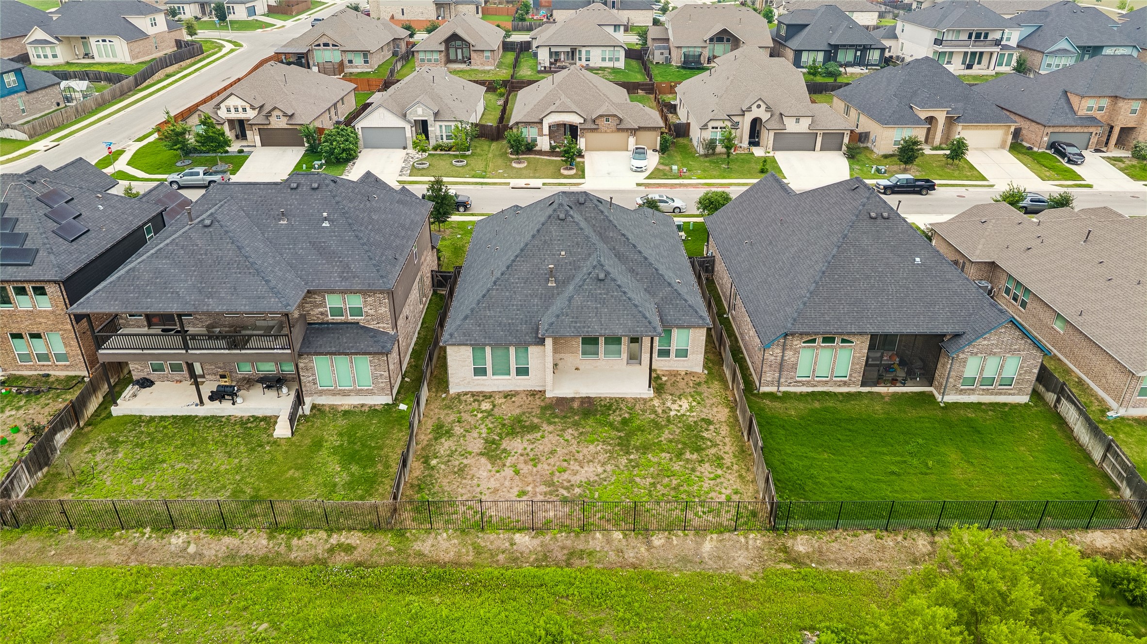 298 Wild Pecan Loop Buda, TX 78610 - Photo 35 of 40 an aerial view of a house