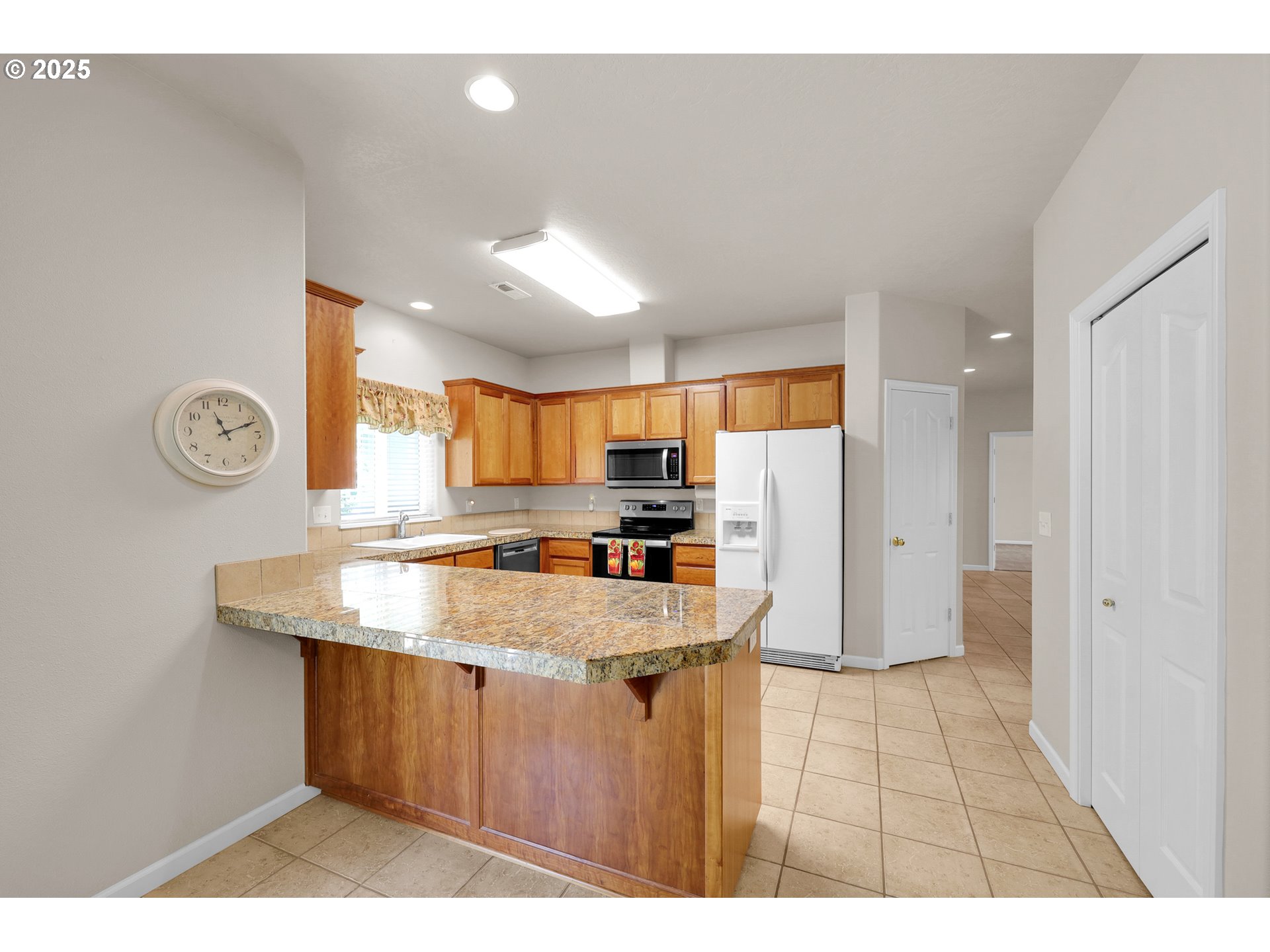 88075 9th Street Veneta, OR 97487 - Photo 14 of 45 a kitchen with a sink cabinets and wooden floor