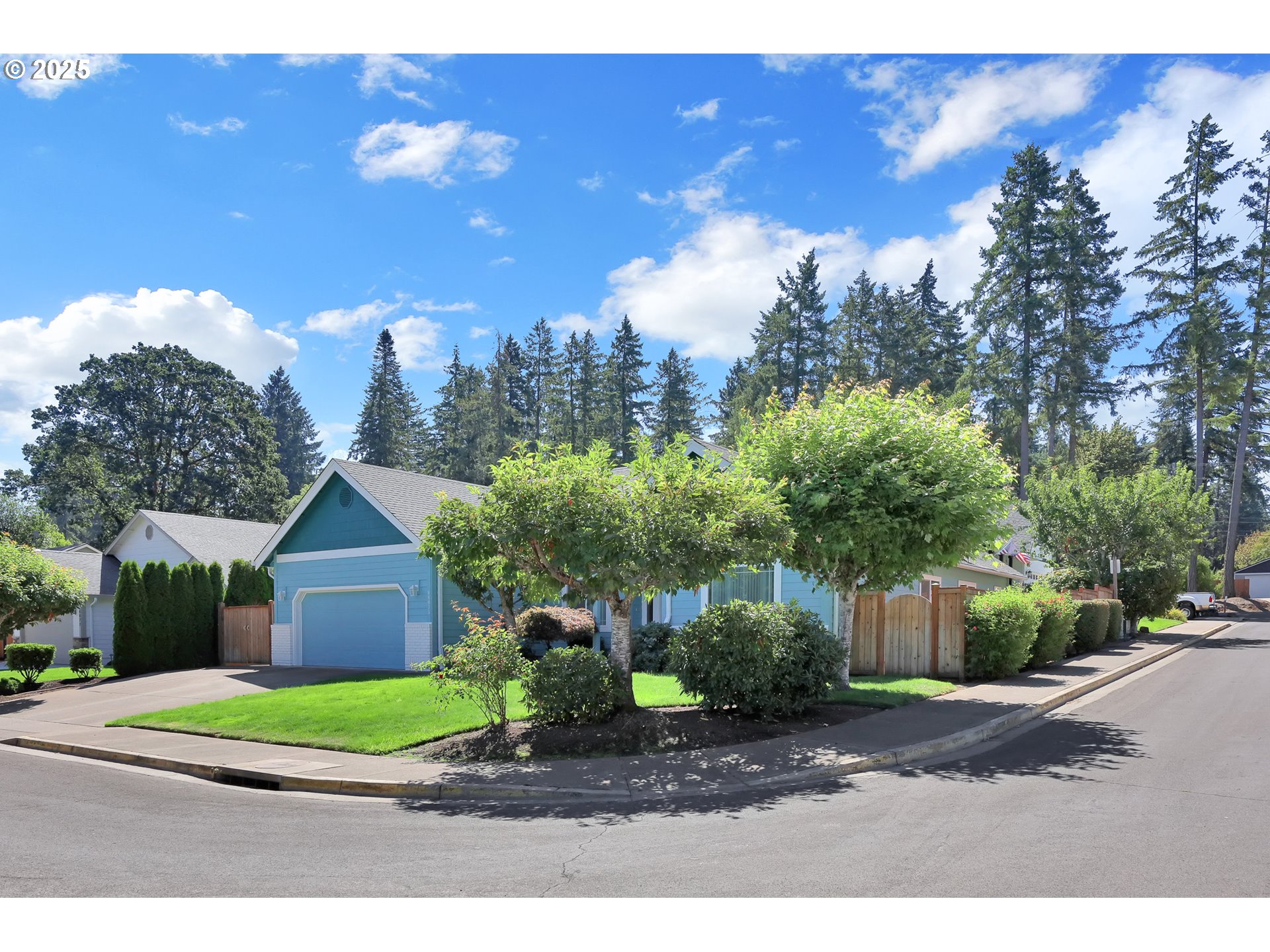 88075 9th Street Veneta, OR 97487 - Photo 2 of 45 a front view of a house with a yard and garage