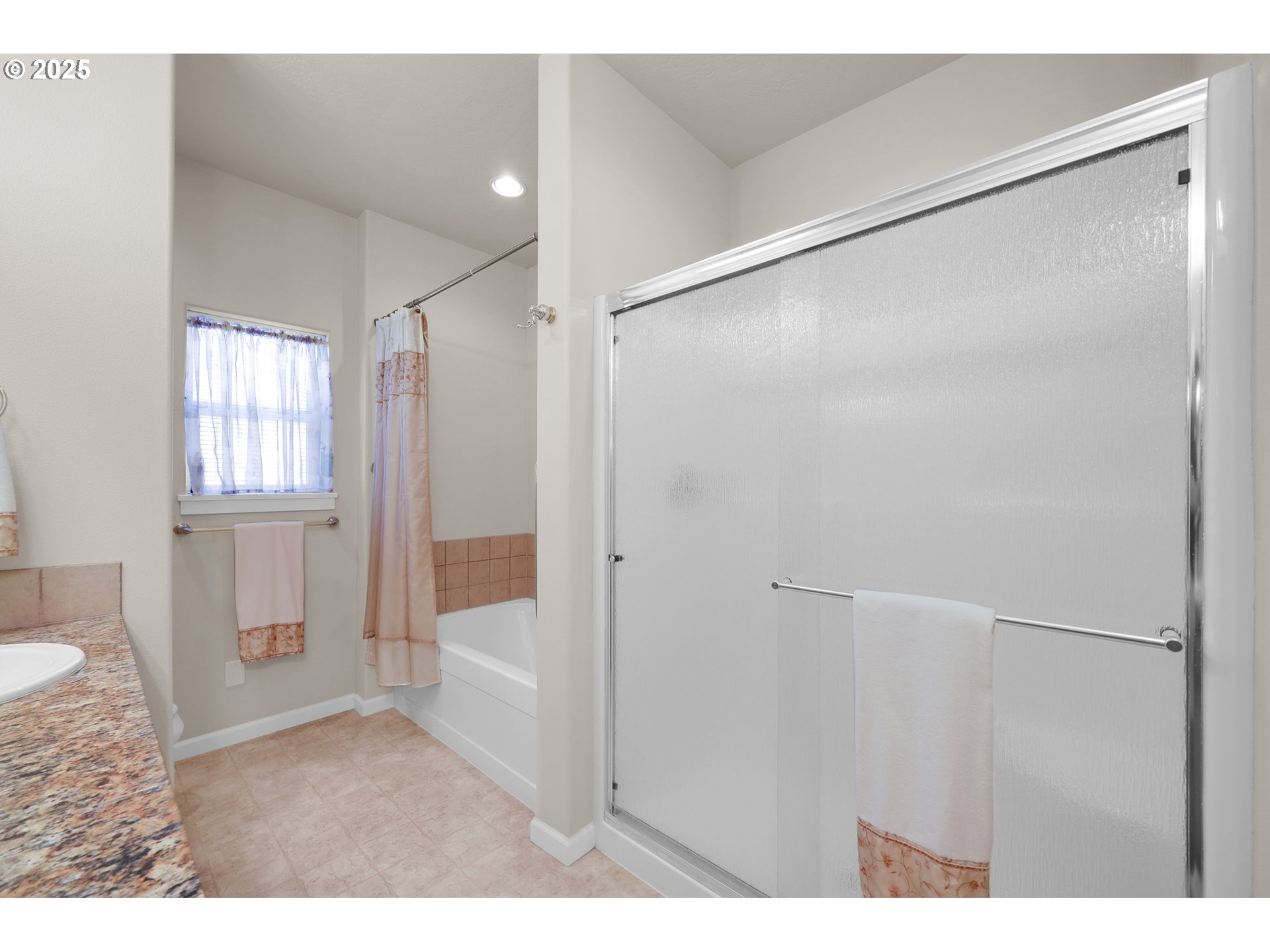 88075 9th Street Veneta, OR 97487 - Photo 27 of 45 a bathroom with a shower and a bath tub