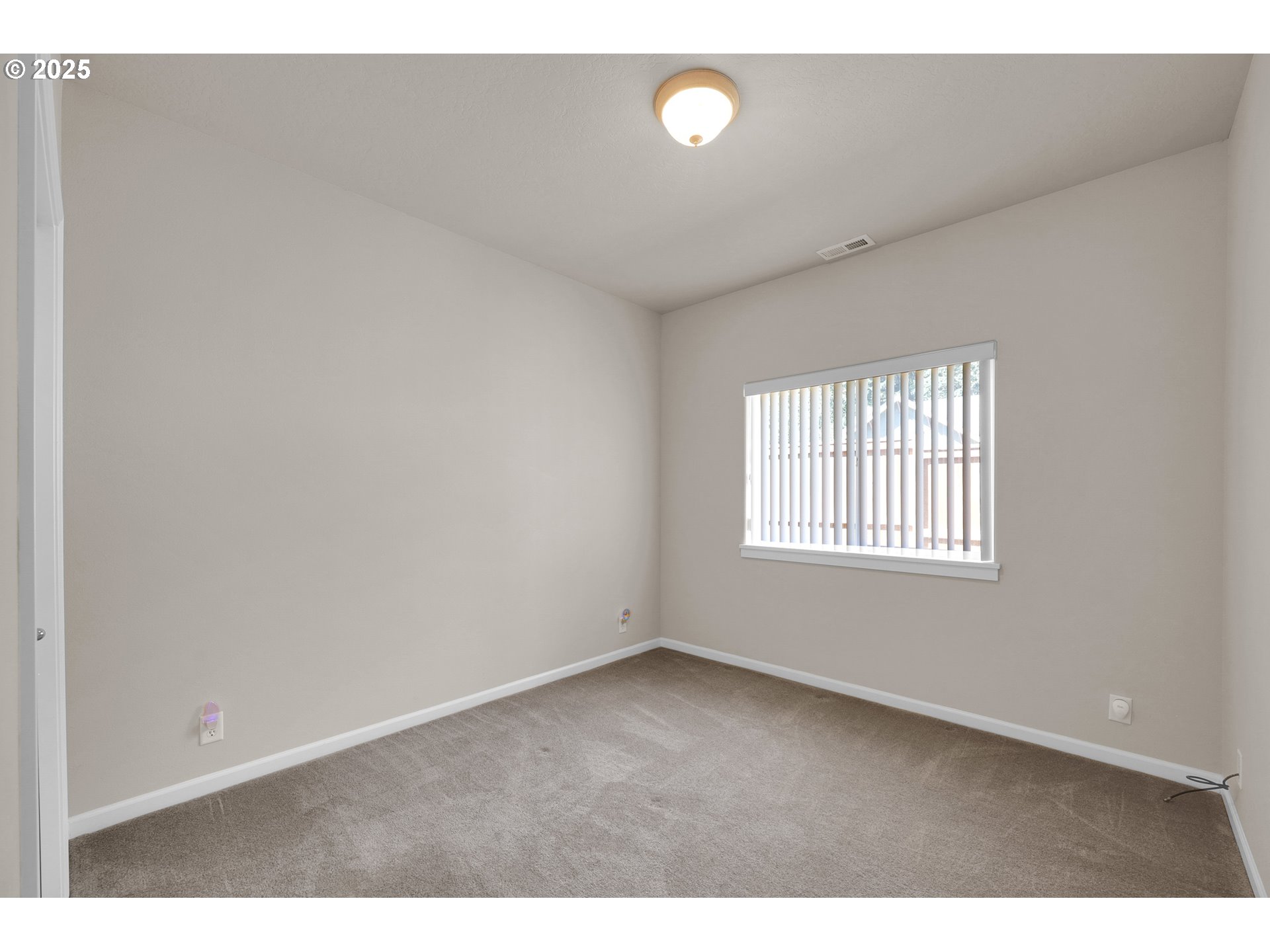 88075 9th Street Veneta, OR 97487 - Photo 33 of 45 a view of an empty room with a window