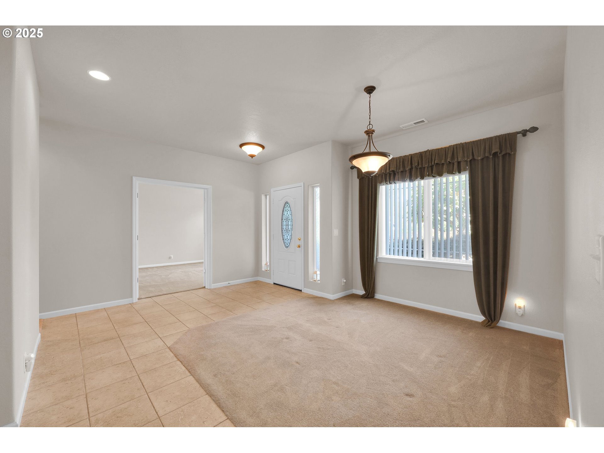 88075 9th Street Veneta, OR 97487 - Photo 6 of 45 a view of an empty room with a window and cabinet