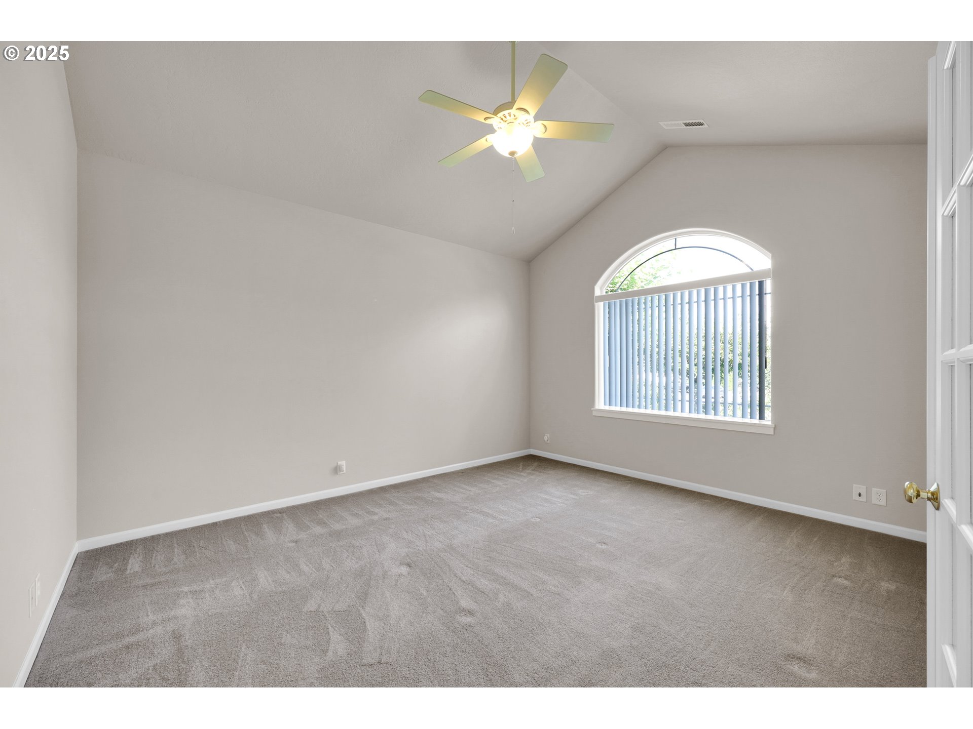 88075 9th Street Veneta, OR 97487 - Photo 9 of 45 a view of an empty room with a window