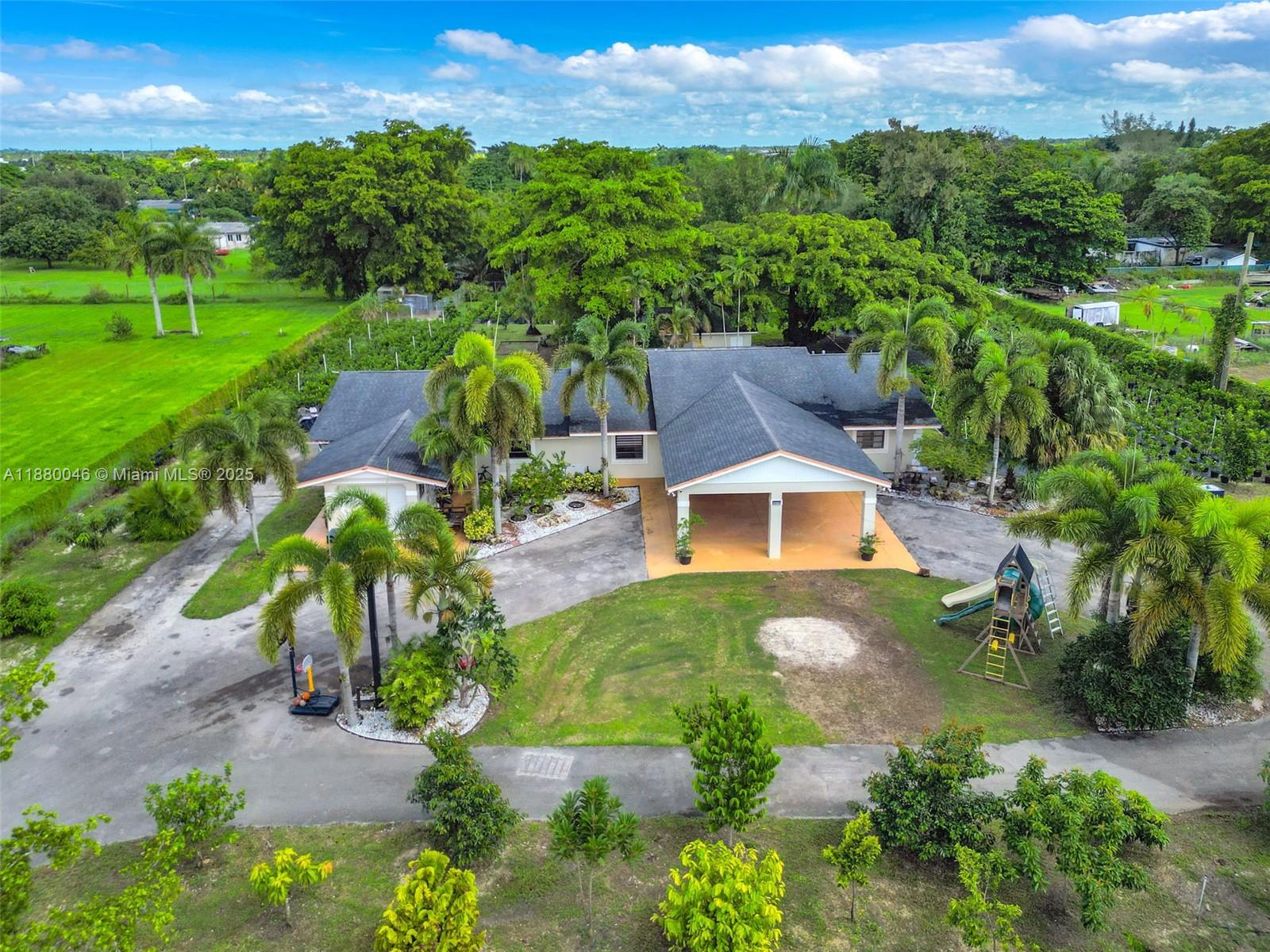 an aerial view of a house with a garden