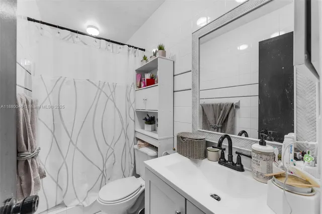 a bed room with a bed and a window