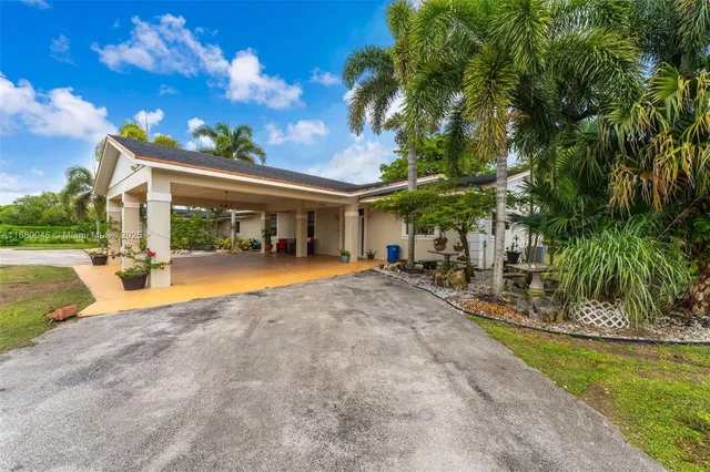 a view of a living room and kitchen