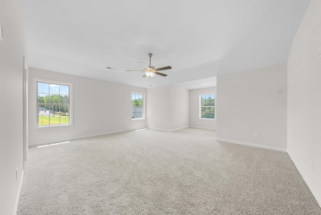 623 Bohannon Road Grantville, GA 30220 - Photo 19 of 34 an empty room with windows and closet