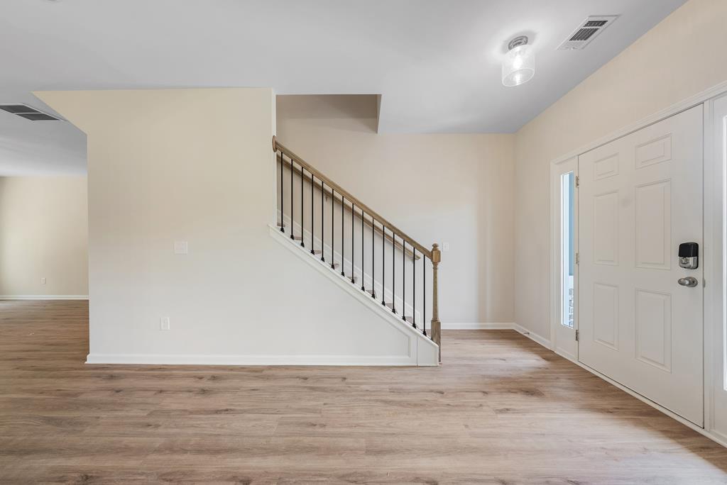 623 Bohannon Road Grantville, GA 30220 - Photo 2 of 34 a view of a hallway with staircase