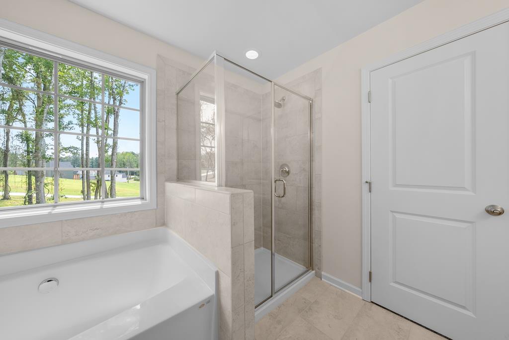 623 Bohannon Road Grantville, GA 30220 - Photo 23 of 34 a bathroom with a shower and a bathtub