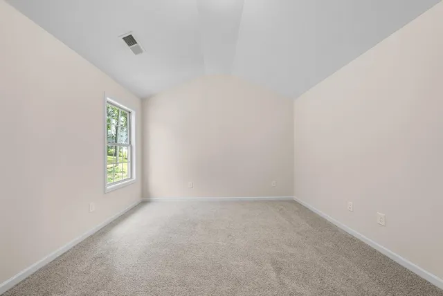 a view of an empty room with window