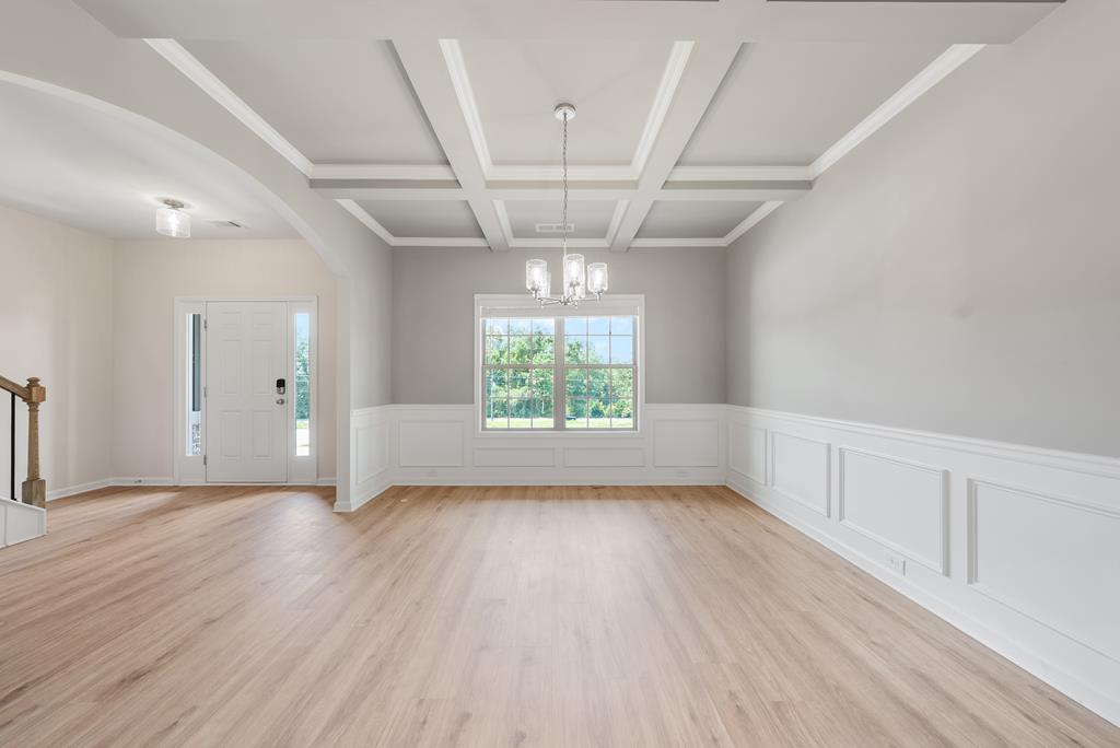 623 Bohannon Road Grantville, GA 30220 - Photo 4 of 34 wooden floor in an empty room with a window