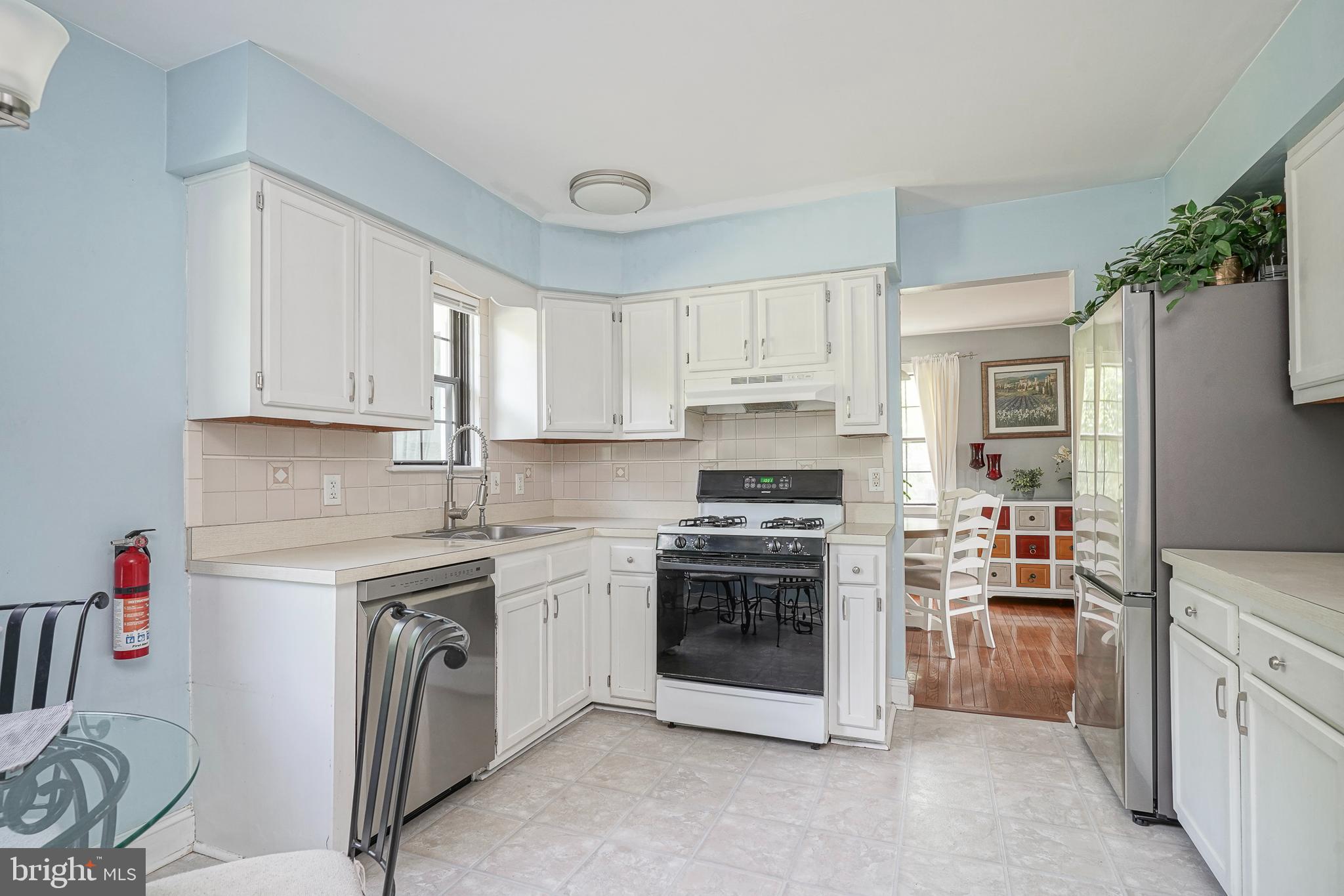 16 Scenic View Drive Sicklerville, NJ 08081 - Photo 10 of 38 a kitchen with granite countertop a sink stove and cabinets