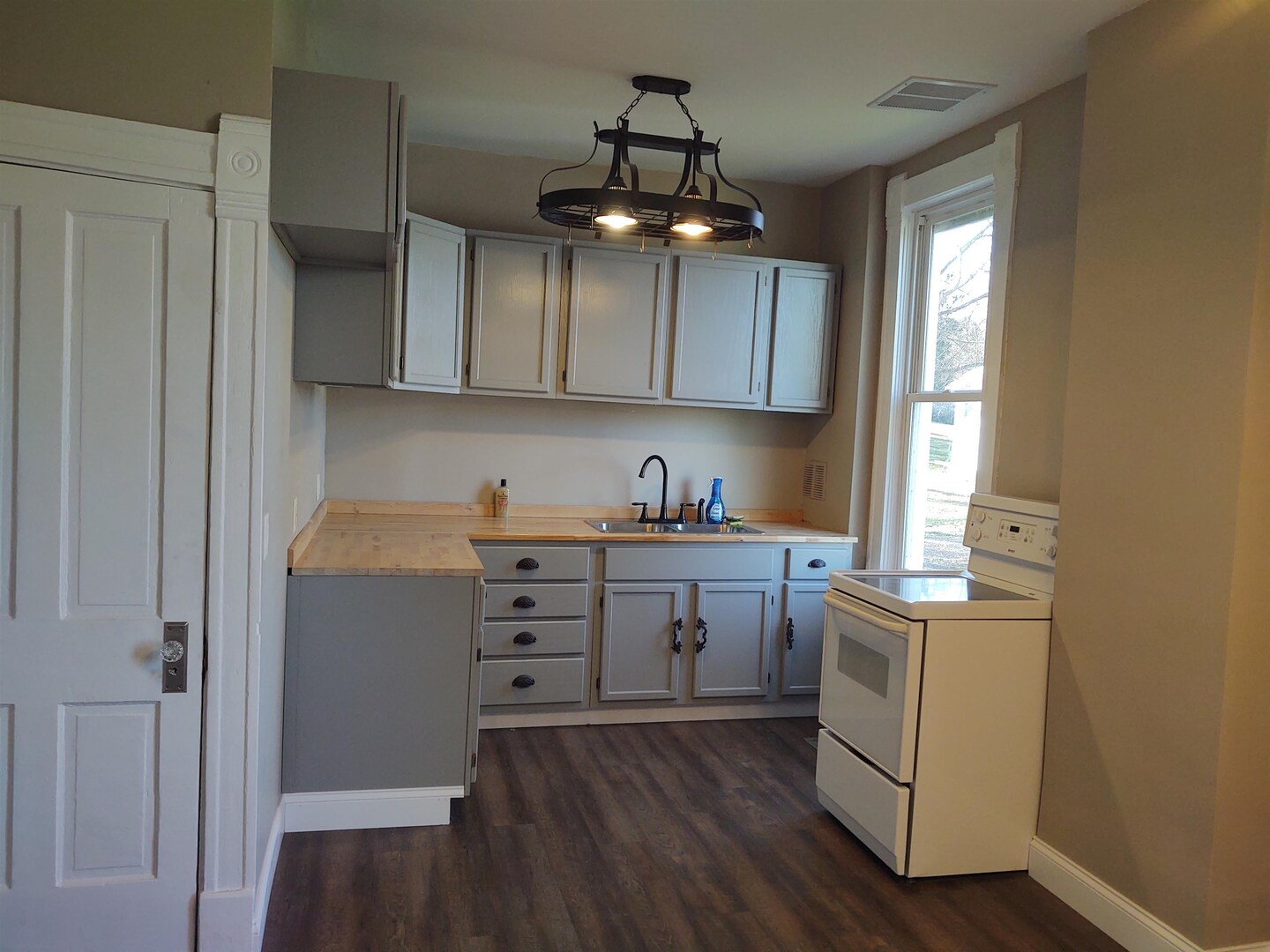 603 North 5th Street Vienna, IL 62995 - Photo 7 of 24 a kitchen with a refrigerator and window