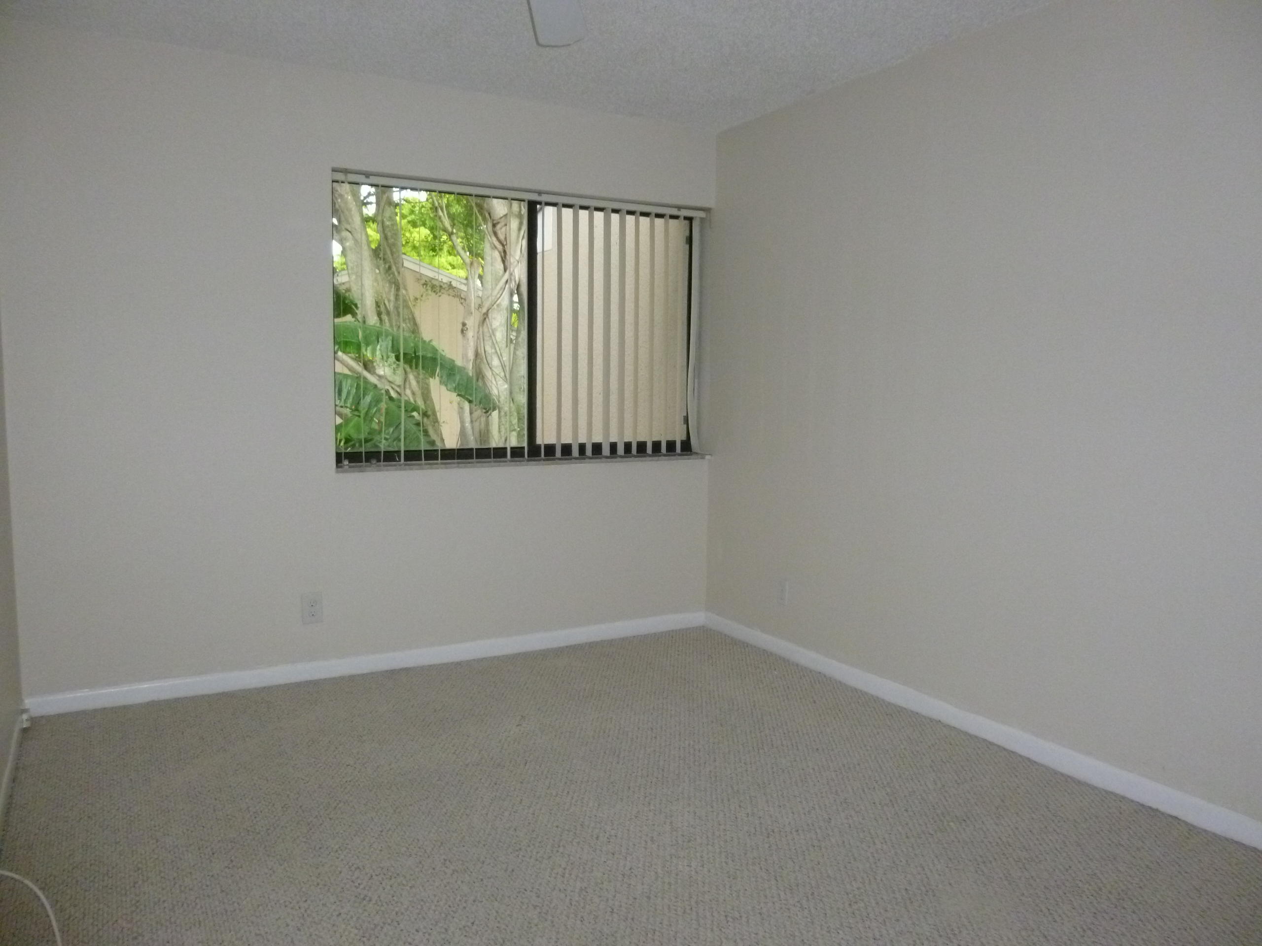 1069 Northwest 13th Street, Unit 2 Boca Raton, FL 33486 - Photo 23 of 35 Bedroom 3