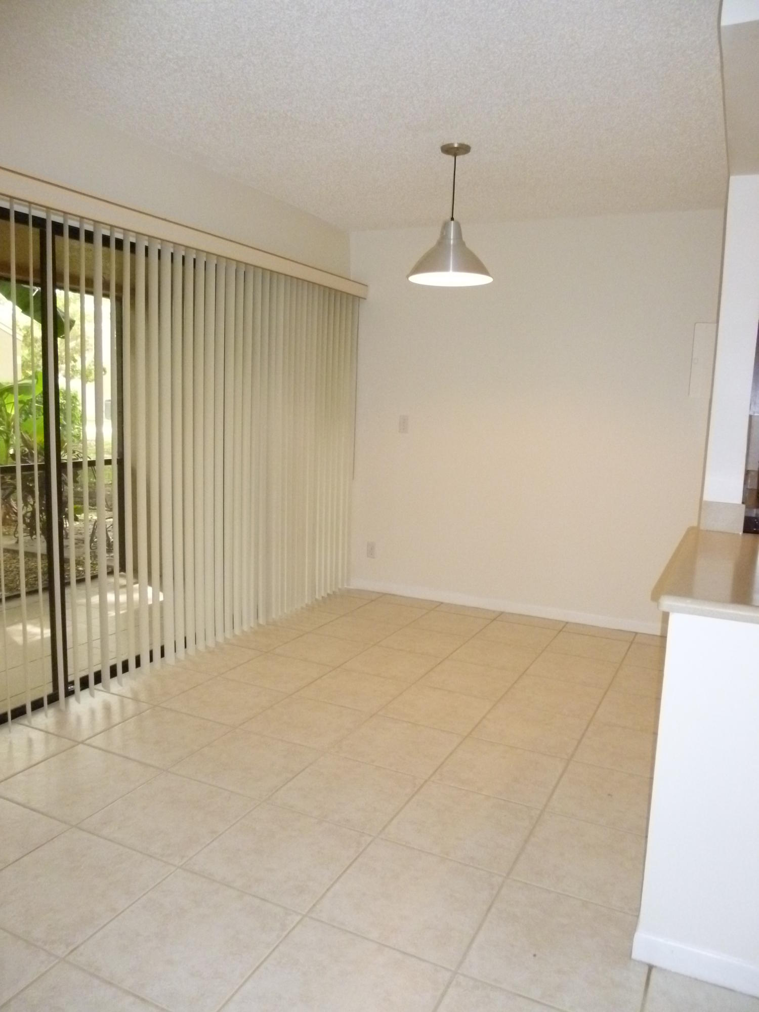 1069 Northwest 13th Street, Unit 2 Boca Raton, FL 33486 - Photo 8 of 35 Dining Room